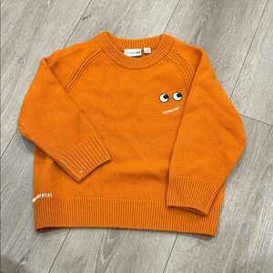 Uniqlo Orange Kids Sweater with Playful Design